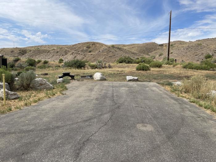 A photo of Site 54 of Loop B at GREEN RIVER CAMPGROUND with Picnic Table, Fire Pit