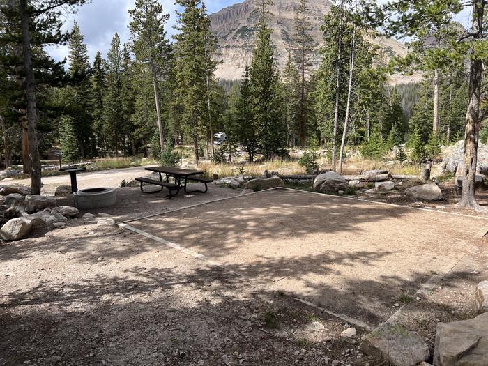 A photo of Site 030 of Loop C at MIRROR LAKE with Picnic Table, Fire Pit, Tent Pad