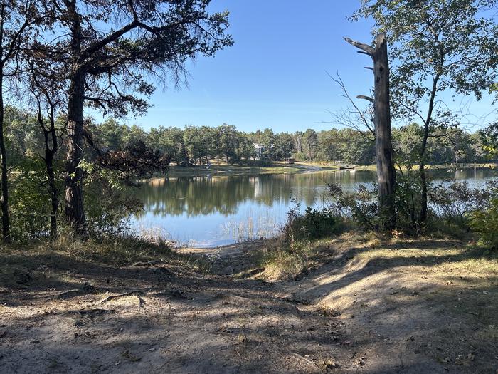 A photo of Site 32 of Loop Beaver at Mack Lake ORV Campground with Waterfront