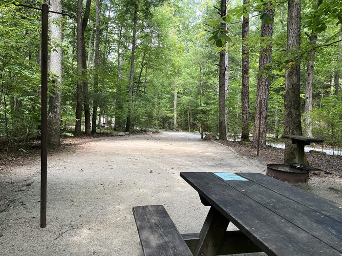 A photo of Site 030 of Loop B at CAVE MOUNTAIN LAKE FAMILY CAMP with Shade, Tent Pad