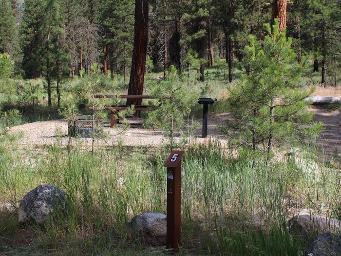 Site 5 site post, in the shade behind treesSite 5, Mountain View Campground, Boise National Forest