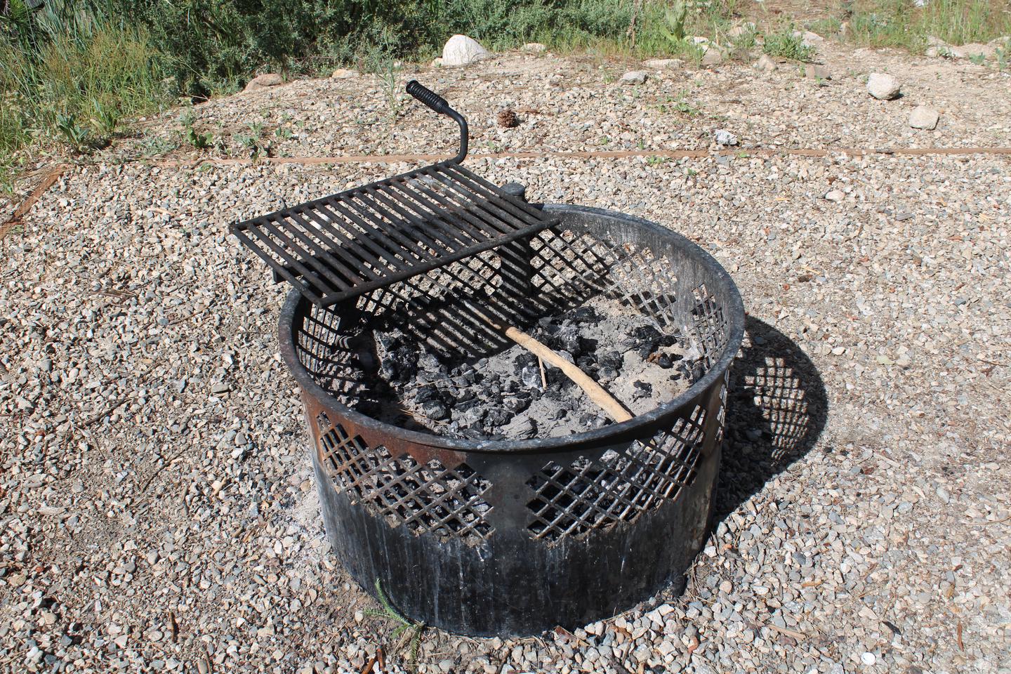 Site grill, set in gravelSite grill