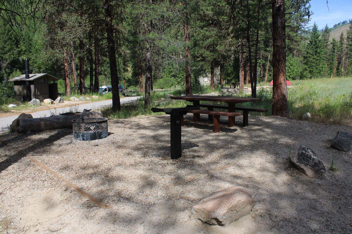 Site picnic table, metal table, and fire ring