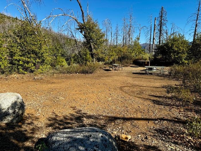 A photo of Site 002 of Loop BRANDY CREEK PRIMITIVE CAMPGROUND at BRANDY CREEK PRIMITIVE CAMPGROUND with Picnic Table, Fire Pit, Shade, Food Storage, Lantern Pole