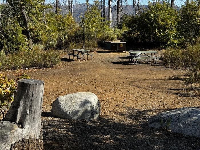 A photo of Site 002 of Loop BRANDY CREEK PRIMITIVE CAMPGROUND at BRANDY CREEK PRIMITIVE CAMPGROUND with Picnic Table, Fire Pit, Shade, Food Storage, Lantern Pole