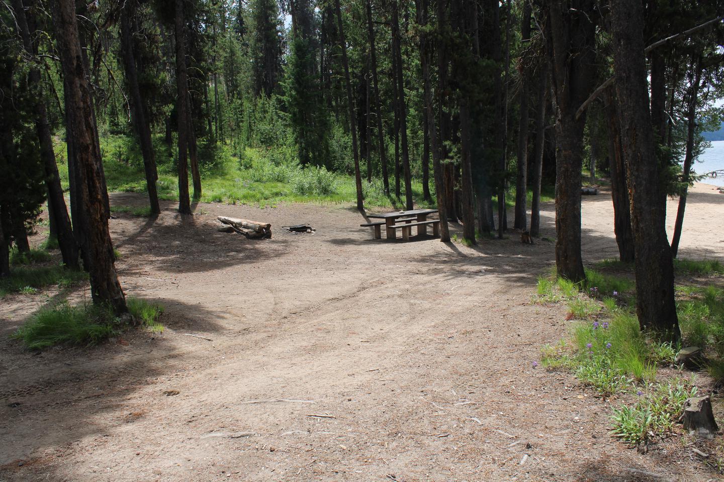 Trailer pad and picnic table on the dirt roadTrailer pad and picnic table