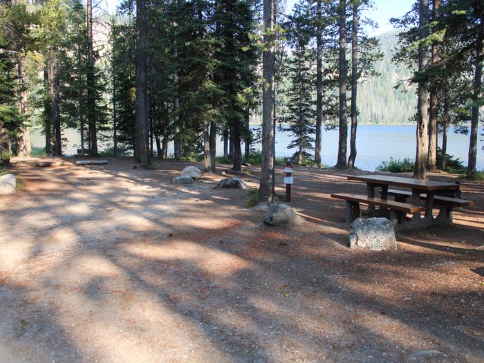 Camp site 4, partially shadedCamp site 4 trailer pad and picnic table