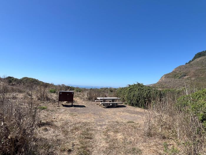 Campsite with picnic table and food storage locker.Wildcat 6