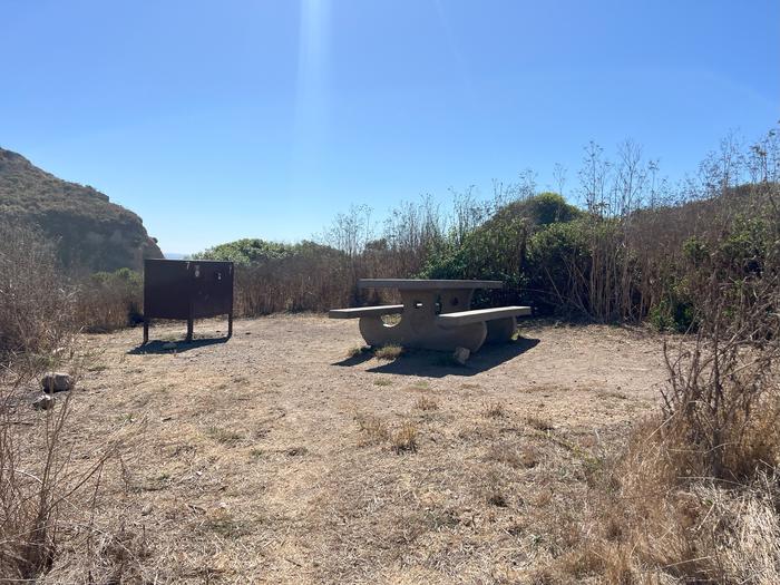 Campsite with picnic table and food storage locker.Wildcat 7