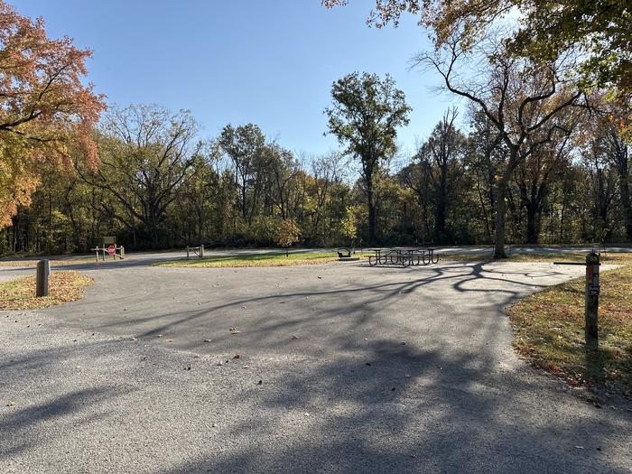 A photo of Site 053 of Loop L2 at Coles Creek Campground with Picnic Table, Electricity Hookup, Fire Pit