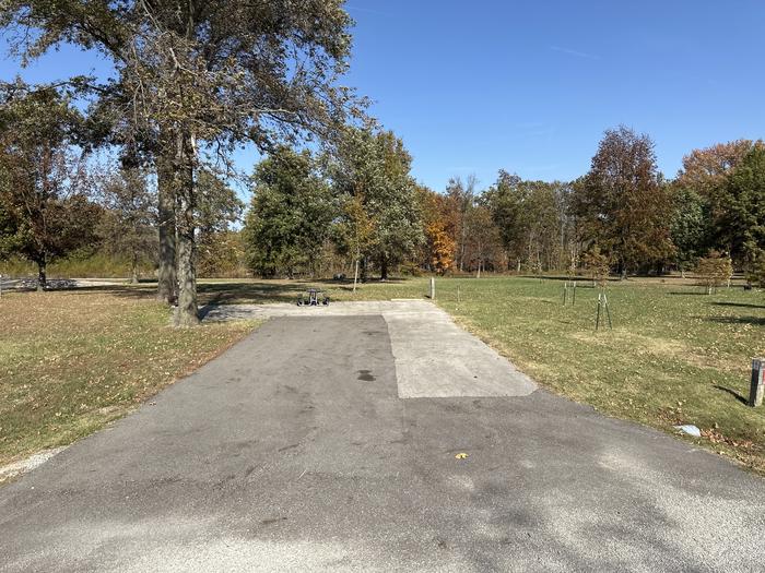 A photo of Site 011 of Loop L1 at Coles Creek Campground with Picnic Table, Electricity Hookup, Fire Pit