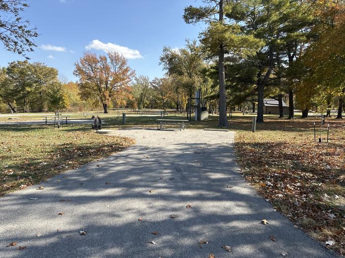 A photo of Site 084 of Loop L4 at Coles Creek Campground with Picnic Table, Electricity Hookup, Fire Pit