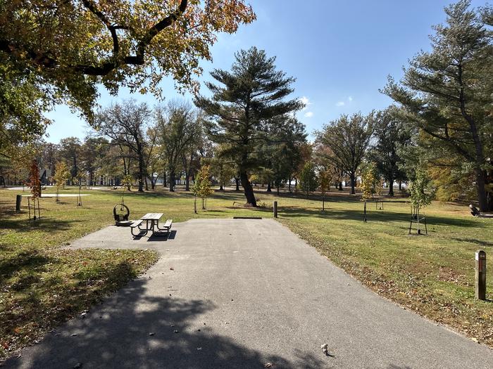 A photo of Site 094 of Loop L4 at Coles Creek Campground with Picnic Table, Electricity Hookup, Fire Pit