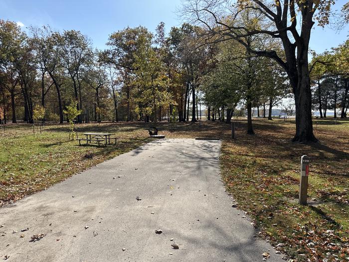 A photo of Site 109 of Loop L5 at Coles Creek Campground with Picnic Table, Electricity Hookup, Fire Pit