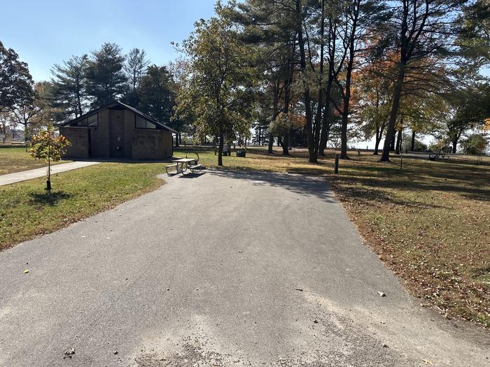 A photo of Site 112 of Loop L5 at Coles Creek Campground with Picnic Table, Electricity Hookup, Fire Pit