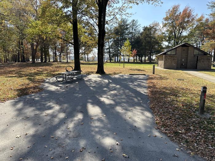 A photo of Site 111 of Loop L5 at Coles Creek Campground with Picnic Table, Electricity Hookup, Fire Pit