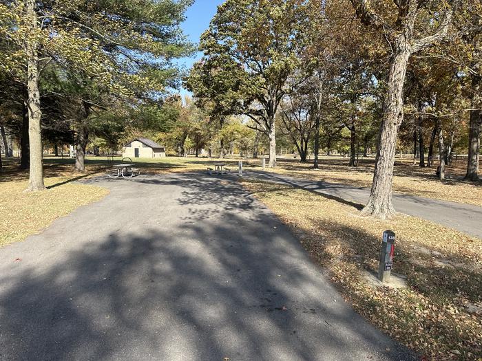 A photo of Site 138 of Loop L5 at Coles Creek Campground with Picnic Table, Electricity Hookup, Fire Pit