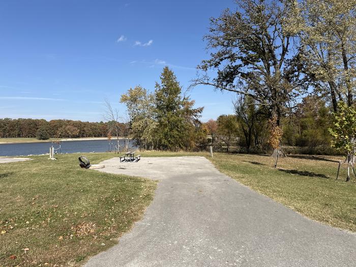 A photo of Site 080 of Loop L4 at Coles Creek Campground with Picnic Table, Electricity Hookup, Fire Pit