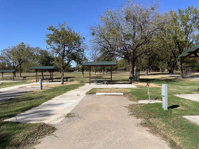 A photo of Site D10 of Loop D at LAKESIDE (OK) with Picnic Table, Electricity Hookup, Fire Pit, Water Hookup