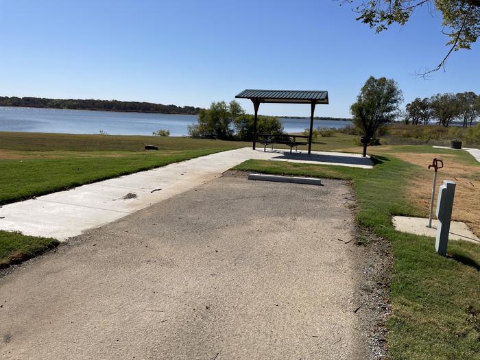 A photo of Site D09 of Loop D at LAKESIDE (OK) with Picnic Table, Electricity Hookup, Fire Pit, Waterfront, Water Hookup