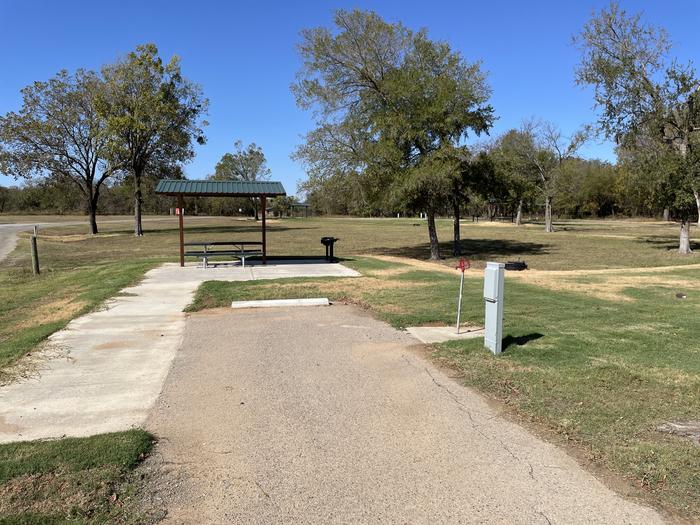 A photo of Site D06 of Loop D at LAKESIDE (OK) with Picnic Table, Electricity Hookup, Fire Pit, Water Hookup