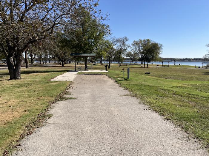 A photo of Site D28 of Loop D at LAKESIDE (OK) with Picnic Table, Electricity Hookup, Fire Pit, Water Hookup