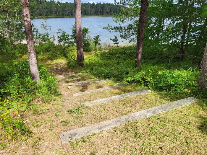 Steps down to the lake from site one Steps down to the lake from site one