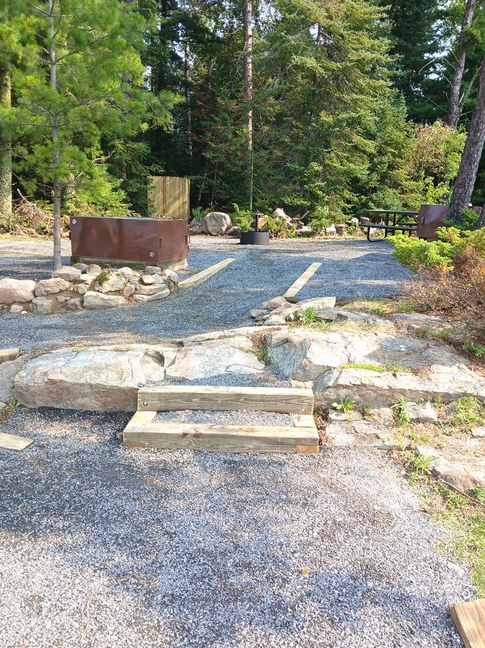 R104 - Saginaw Bay West, view looking into accessible campsite core area.View of accessible campsite core area