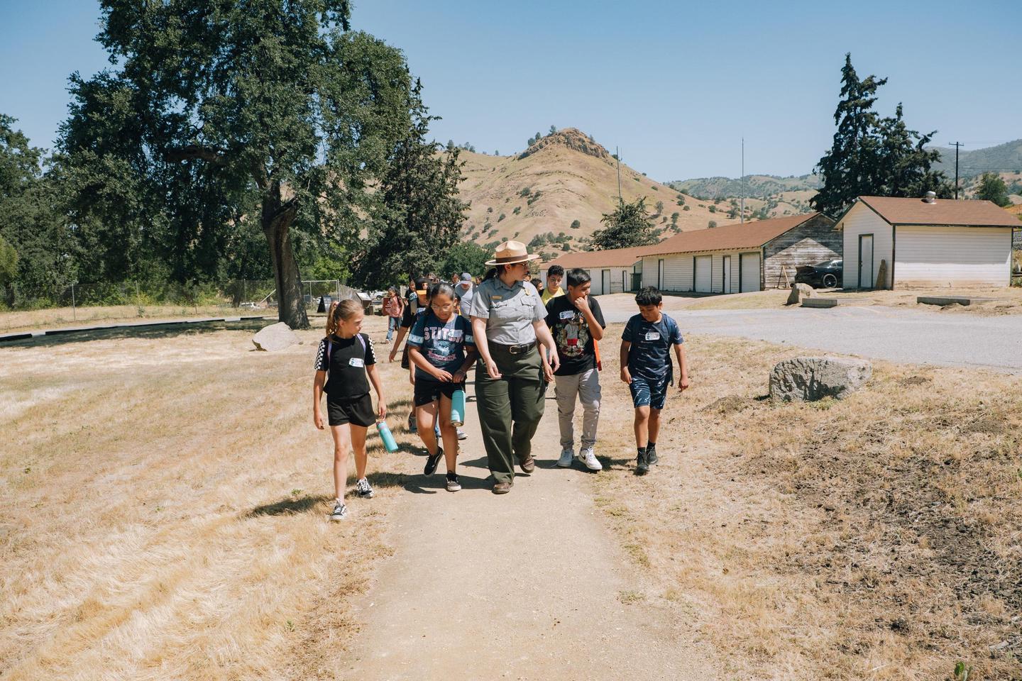 Ranger Leading Kids Back to the Memorial GardenCésar E. Chávez National Monument is a great place for kids to learn about the legacy of one our nation's most important Latino leaders of the twentieth century. Activities include making buttons, guided ranger walks, and earning junior ranger badges.