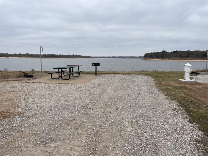 A photo of Site 7 of Loop Appalachia Bay at Appalachia Bay Recreation Area with Boat Ramp, Picnic Table, Electricity Hookup, Fire Pit, Waterfront, Water Hookup