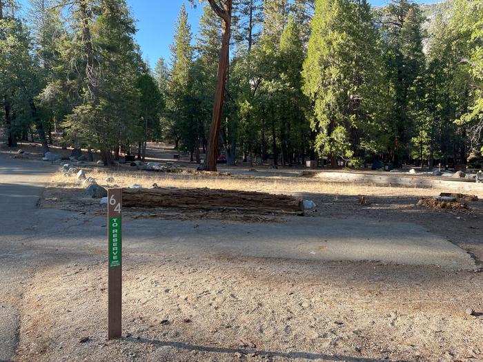 Scene showing parking pad and numbered site post. Parking pad and numbered site post. 