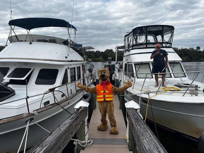 View of Boat SlipsBobber the Water Safety Dog reminding everyone "Life Jackets Worn, Nobody Mourns and if using our overnight slips consider the width of your vessel when choosing a slip. If wider vessel, Slips 1 and 8 are your best options.