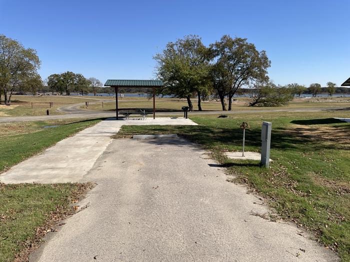 A photo of Site D20 of Loop D at LAKESIDE (OK) with Picnic Table, Electricity Hookup, Fire Pit, Water Hookup