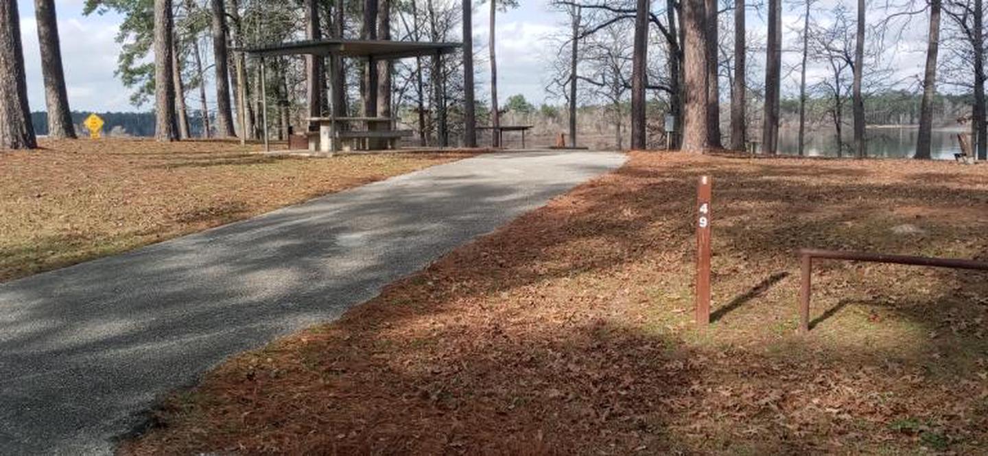 A photo of Site 49 of Loop LOOB at SAN AUGUSTINE with Picnic Table, Lean To / Shelter, Fire Pit, Electricity Hookup, Water Hookup, Shade