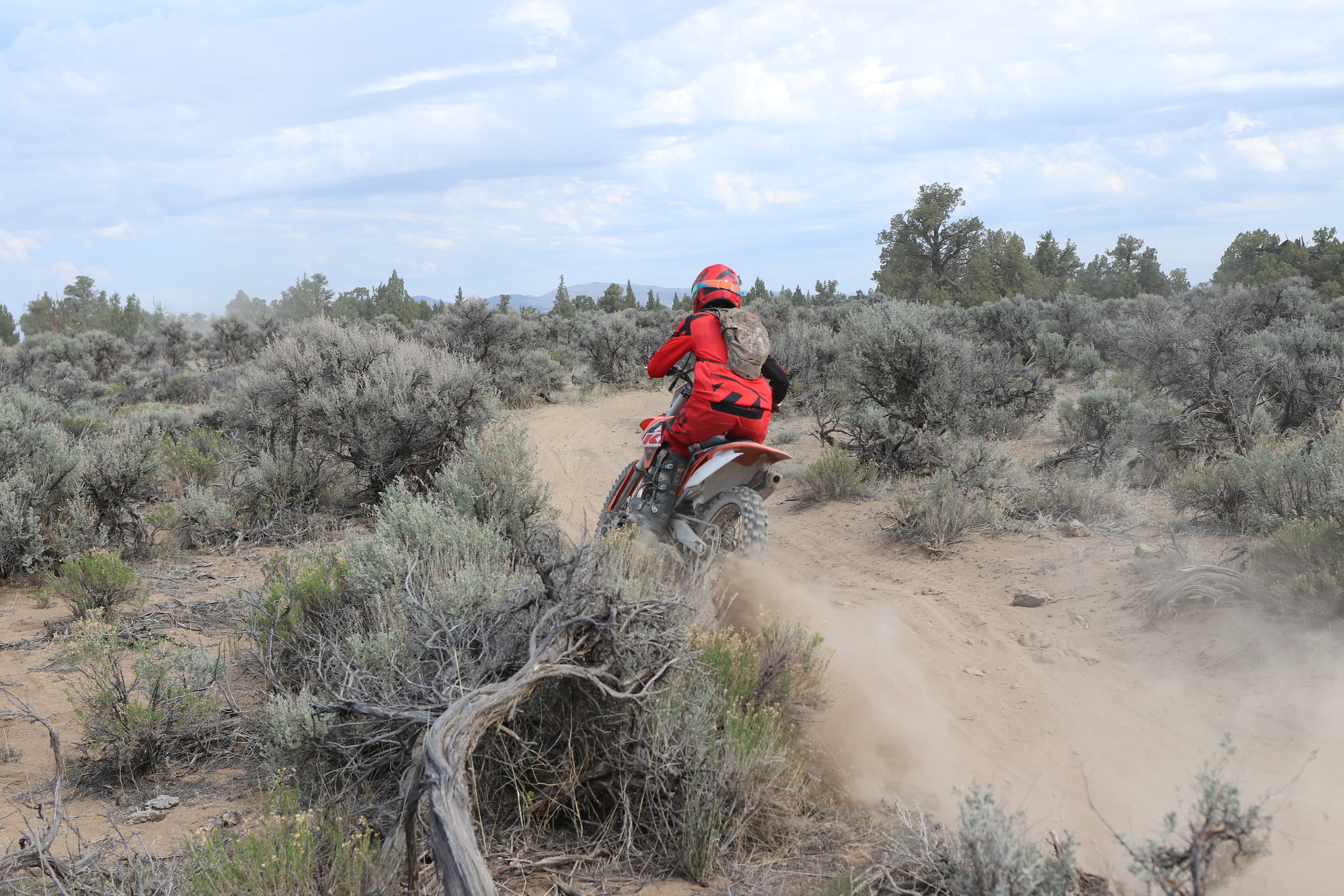 Dirt Biker on trail in Millican Valley