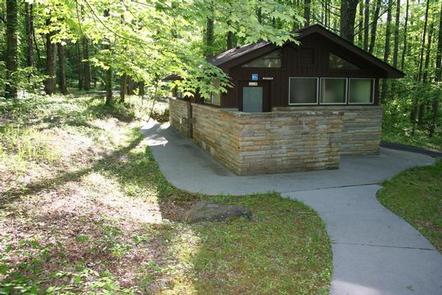 Handicap accessible restroomPaved trail from ADA sites to handicap accessible restroom. 