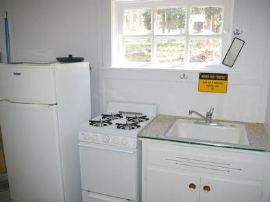 DEER CREEK CABIN (WY)propane fridge and cookstove, sink for summer use.