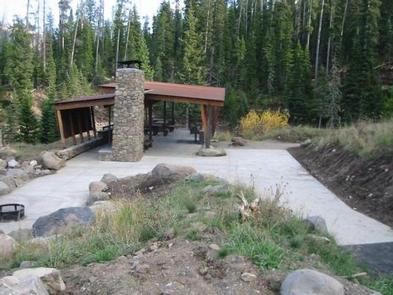 Hyalite Pavilion, fireplace, picnic tables, fire ring & pine treesHyalite Pavilion