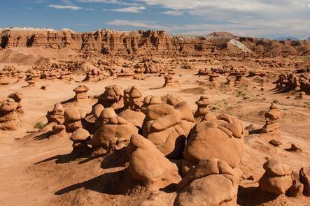 Goblin Valley State ParkGoblin Valley challenges you with its geologic whimsy. The landscape, covered with sandstone goblins and fascinating formations, is often compared to Mars.