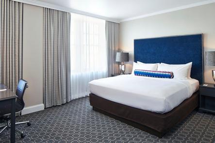 King GuestroomEach of the 108 guestrooms offer every modern comfort guests expect. Luxurious linens, a Keurig® coffeemaker, and an iHome dock ensure that comfort is paramount, while complimentary WiFi and an ergonomic desk allow work to move forward.