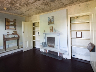 ParlorWall mounted illustrations show how the room may have been furnished when Edgar Allan Poe lived in the house.