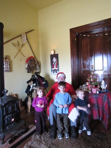Visiting SantaYoung visitors get their picture taken with Santa during the fort's Christmas Past event.