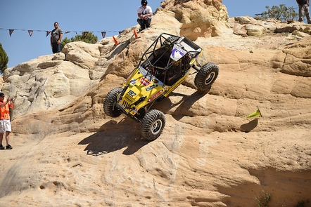 Rock Crawling event at Glade Run Recreation AreaAn off-road vehicle is crawling down an extremely steep sandstone slope.