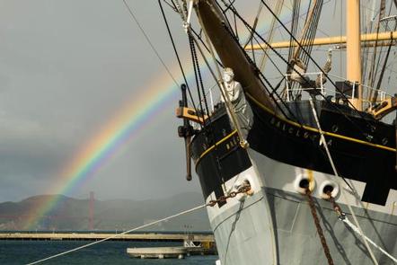 Aquatic Park Cove San Francisco Maritime NHPBalclutha's figurehead with rainbow and Golden Gate Bridge in background.