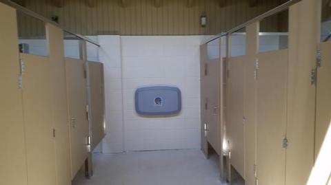 Restroom stalls in Clark Lake pavilion shower rooms.Restrooms within the shower rooms at the Clark Lake pavilion.